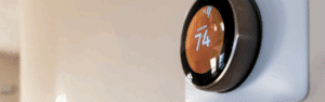 Close up of a Thermostat set to 74 degrees