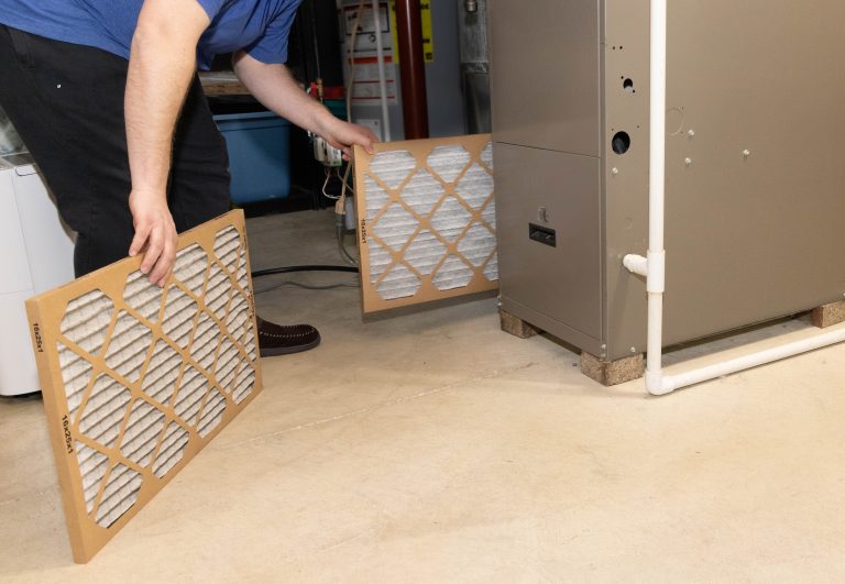 replacing an older furnace filter for better air flow