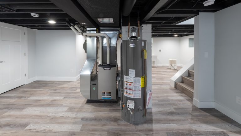 home has been updated with a new residential furnace and hot water tank installed in the basement